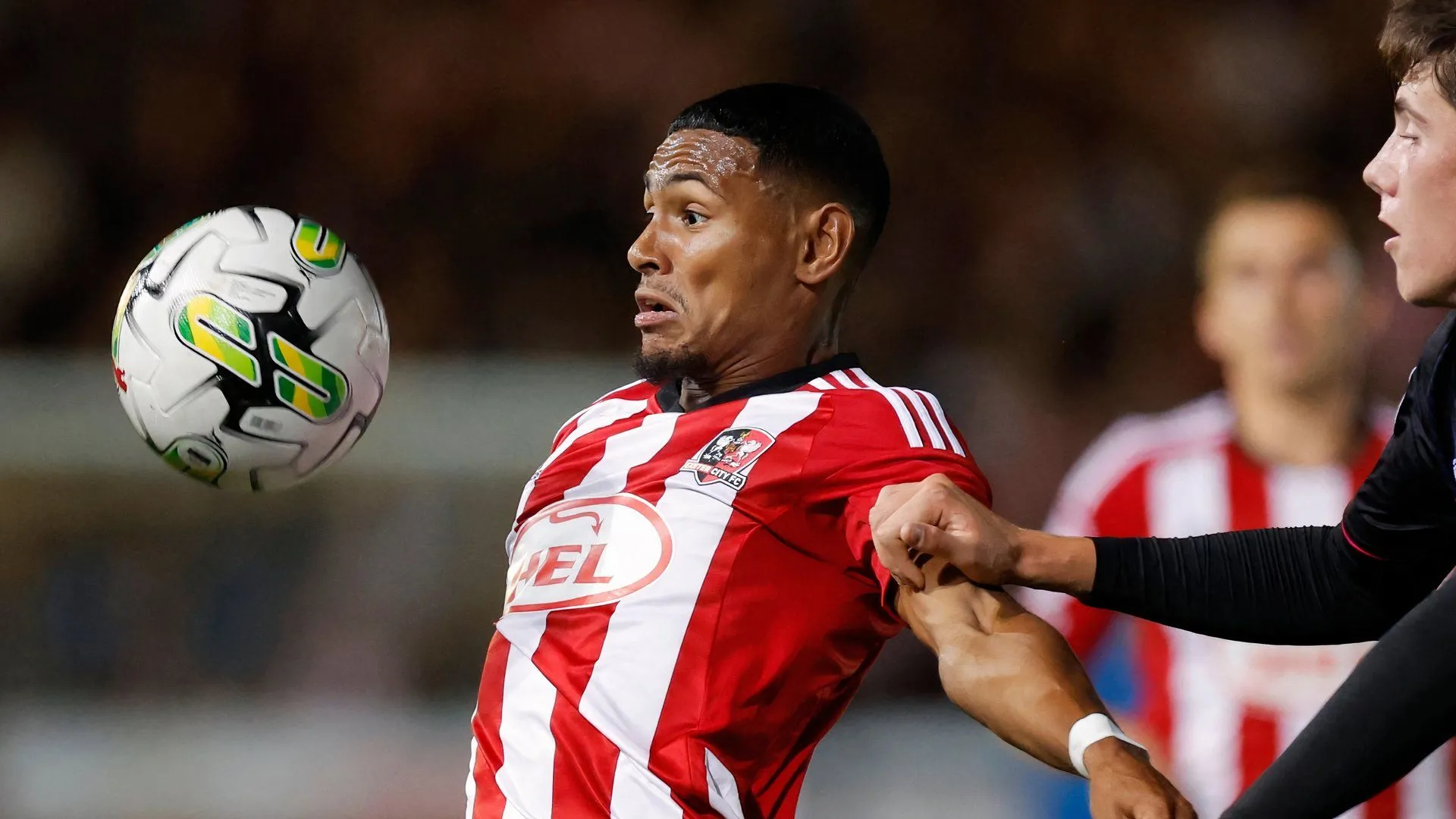 Demetri Mitchell trong màu áo Exeter City thi đấu tại League One